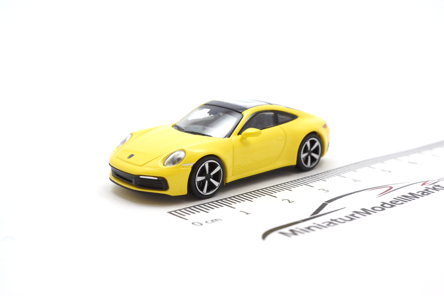 Minichamps 870068322 Porsche 911 (992) Carrera 4S - Gelb - 2019 1:87