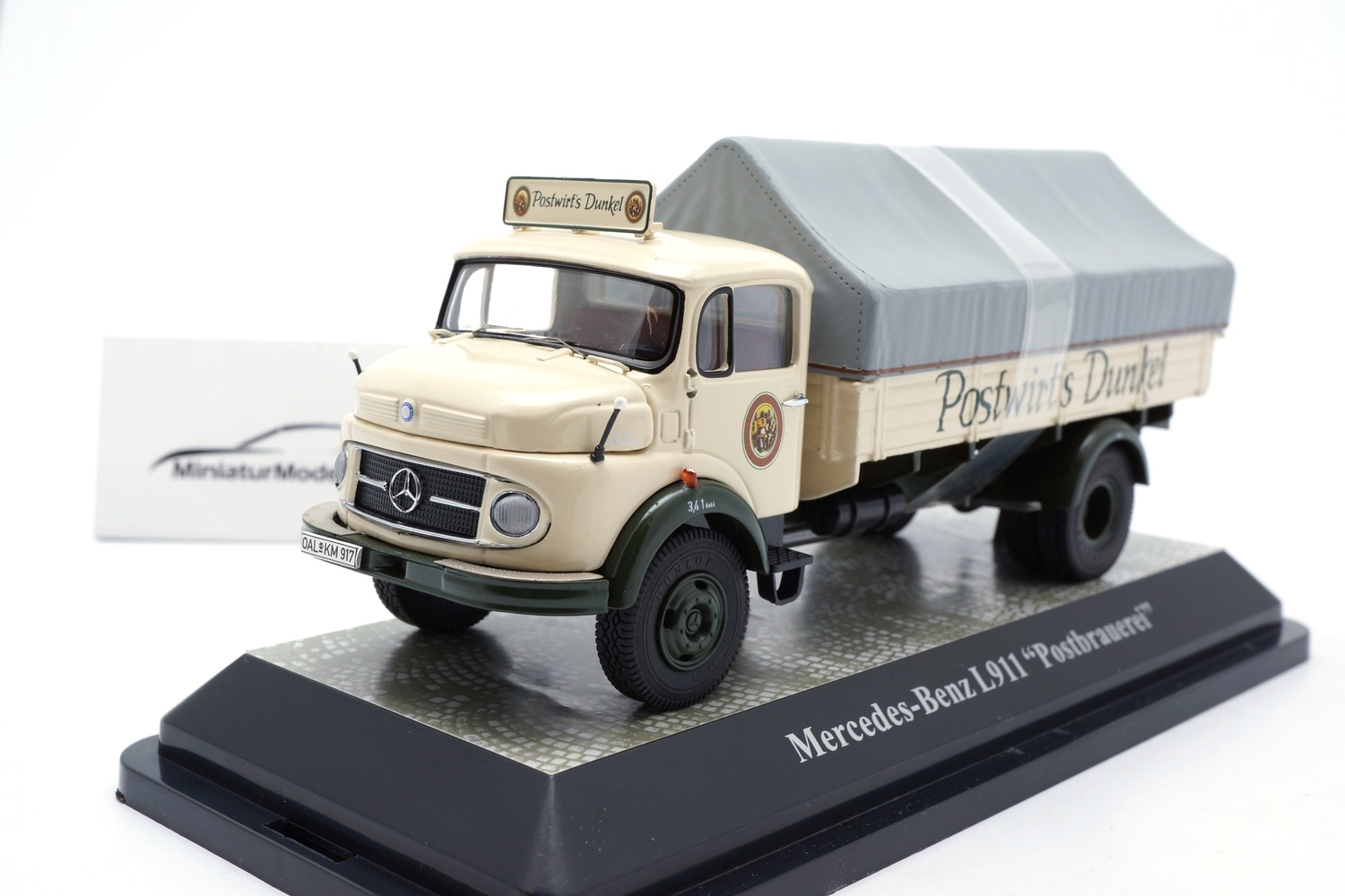 Premium ClassiXXs 12059 Mercedes L911 Pritsche - Postswirts Dunkel 1:43