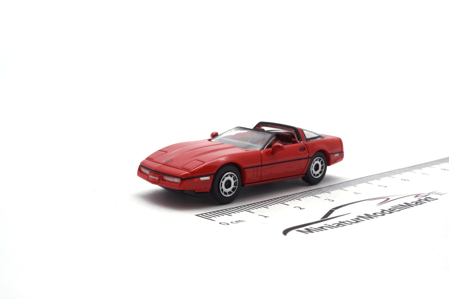 PCX87 PCX870316 Chevrolet Corvette C4, rot, Targadach liegt ein, 1984 1:87