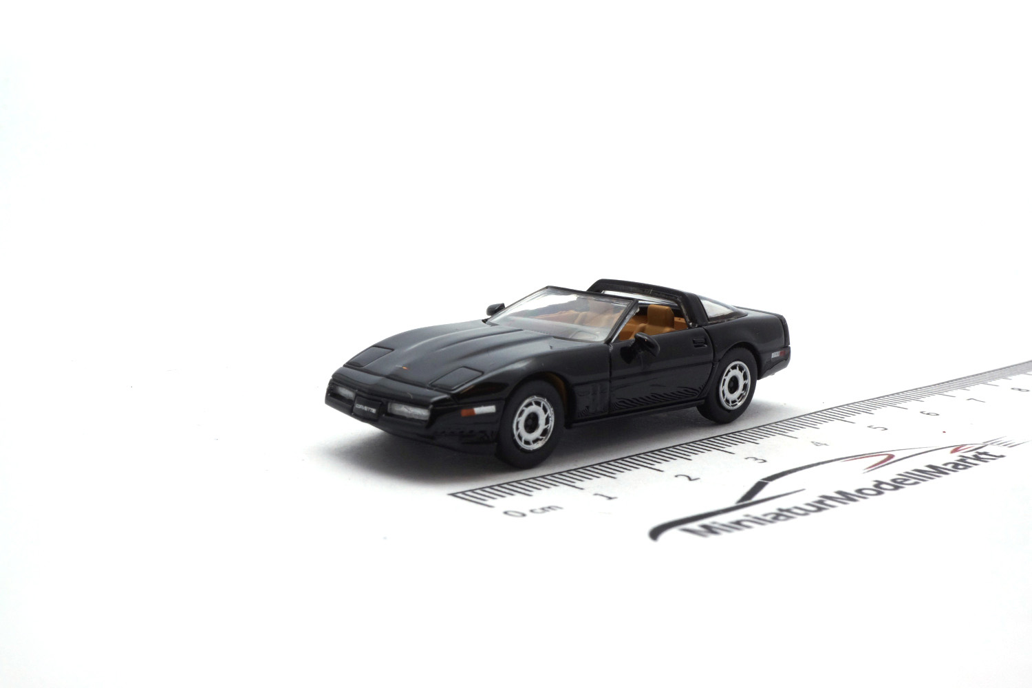 PCX87 PCX870317 Chevrolet Corvette C4, schwarz, Targadach liegt ein, 1984 1:87
