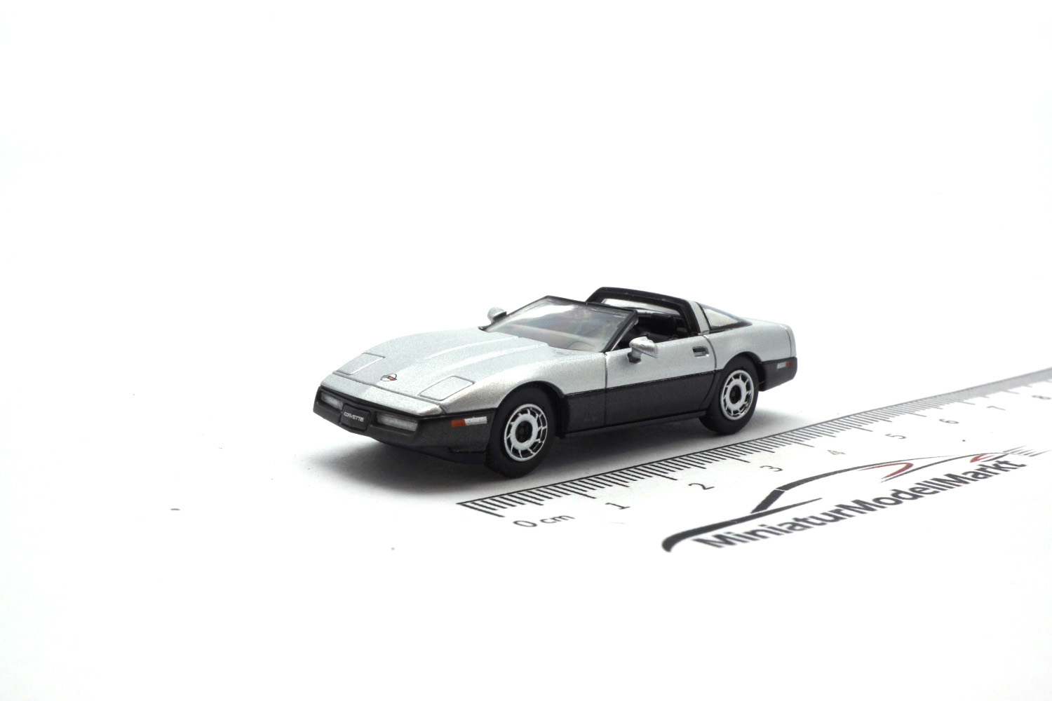PCX87 PCX870318 Chevrolet Corvette C4, silber/metallic-grau, Targadach liegt ein, 1984 1:87