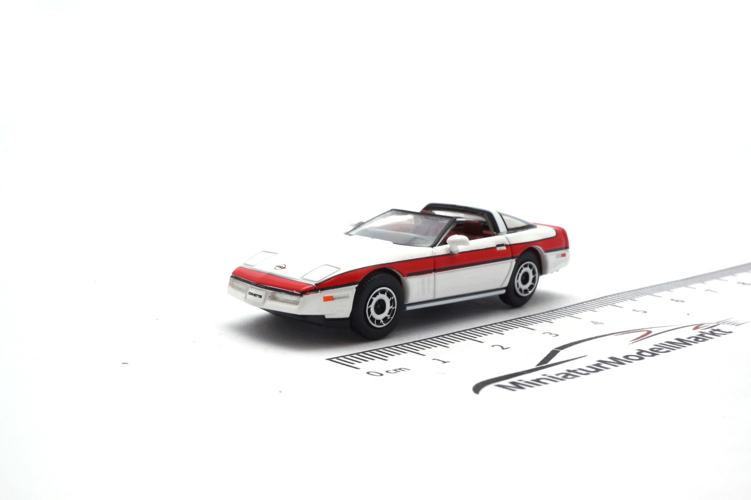 PCX87 PCX870319 Chevrolet Corvette C4, weiss/rot, Targadach liegt ein, 1984 1:87