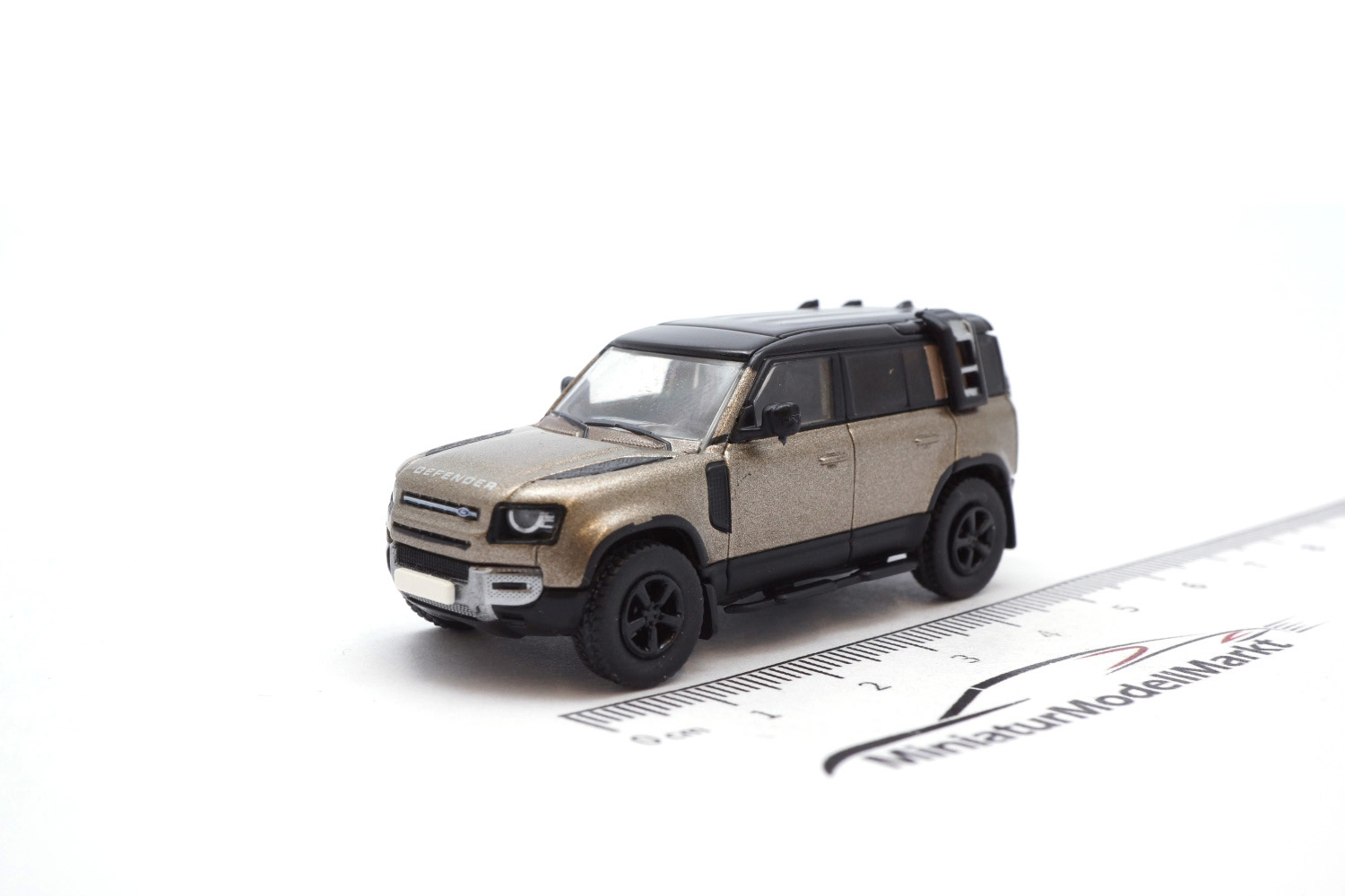 PCX87 PCX870390 Land Rover Defender 110 - dunkelbeige (Metallic) 1:87