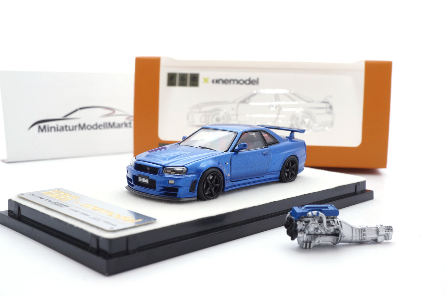 PGM 641002 Nissan Skyline GT-R R34 Z-Tune - Jade Metallic Blue 1:64