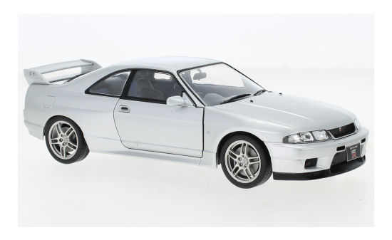 WhiteBox 124110-O Nissan Skyline GT-R (R33), silber, RHD, 1997 1:24